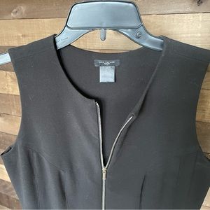 Black sleeveless-A- line dress with zip up front. 6P